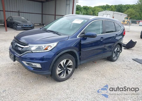 2016 Honda Cr-V Touring z USA, uszkodzony, nr VIN 5J6RM4H99GL120730